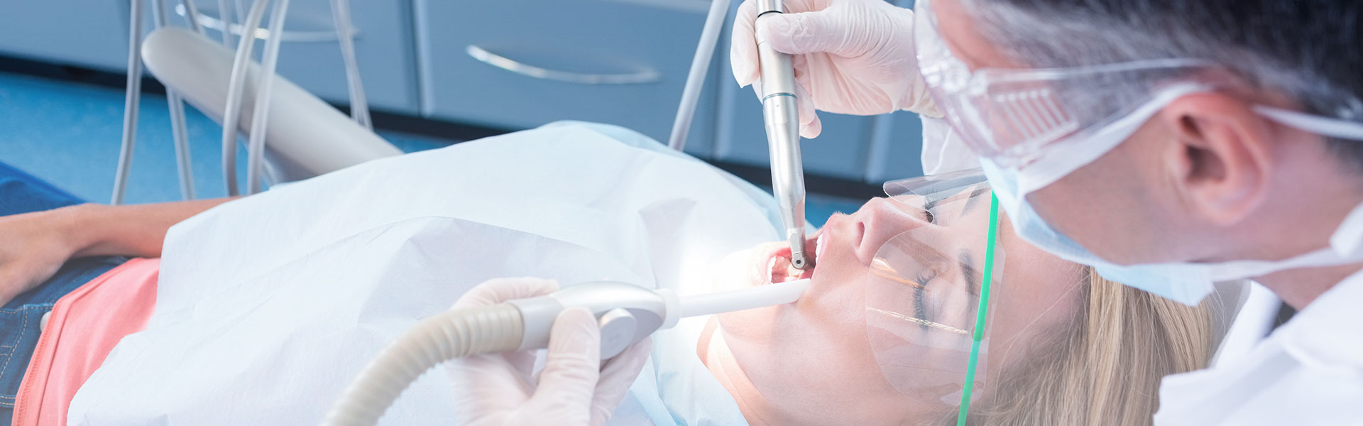 A woman is having emergency dentistry treatment